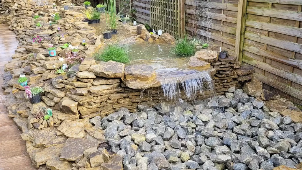 Pond-less water feature built from Horsham stone rocks.